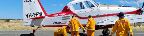 CFA volunteers loading firefighting aircraft